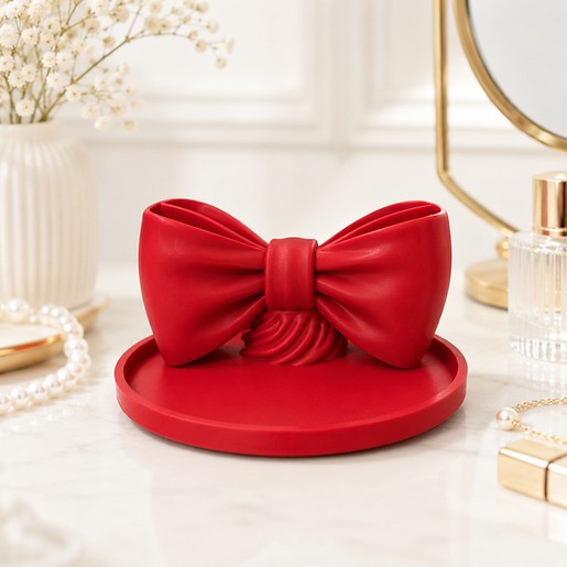 Bow Beauty Organizer Tray - red bow-shaped organizer tray on a vanity